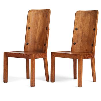 339. Axel Einar Hjorth, a pair of stained pine "Lovö" chairs, Nordiska Kompaniet, Sweden 1930's.