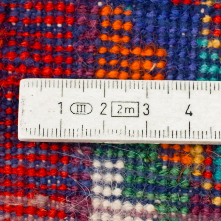 A russian or East Turkestan rug, around 224 x 130 cm.