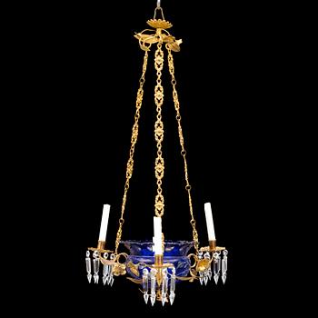 A late Empire gilt metal and glass chandelier, mid 19th Century.
