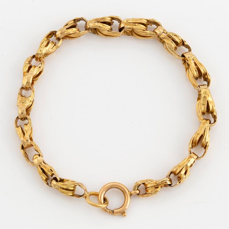 Gold watch chain/bracelet.