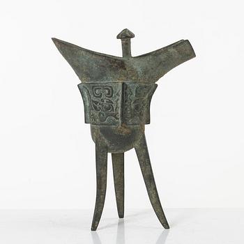 An archaisitic bronze Jue vessel, Qing dynasty.