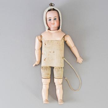 A bisque head multi-face doll, Germany, 1910s.