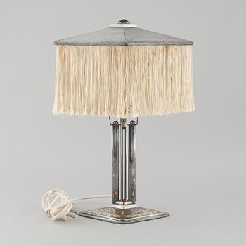 A 1910/20s silver plated table lamp.