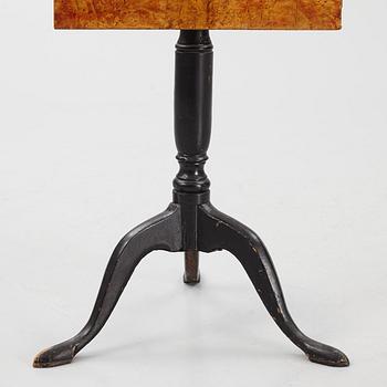 A Swedish burr-veneered tilt-top table, circa 1800.