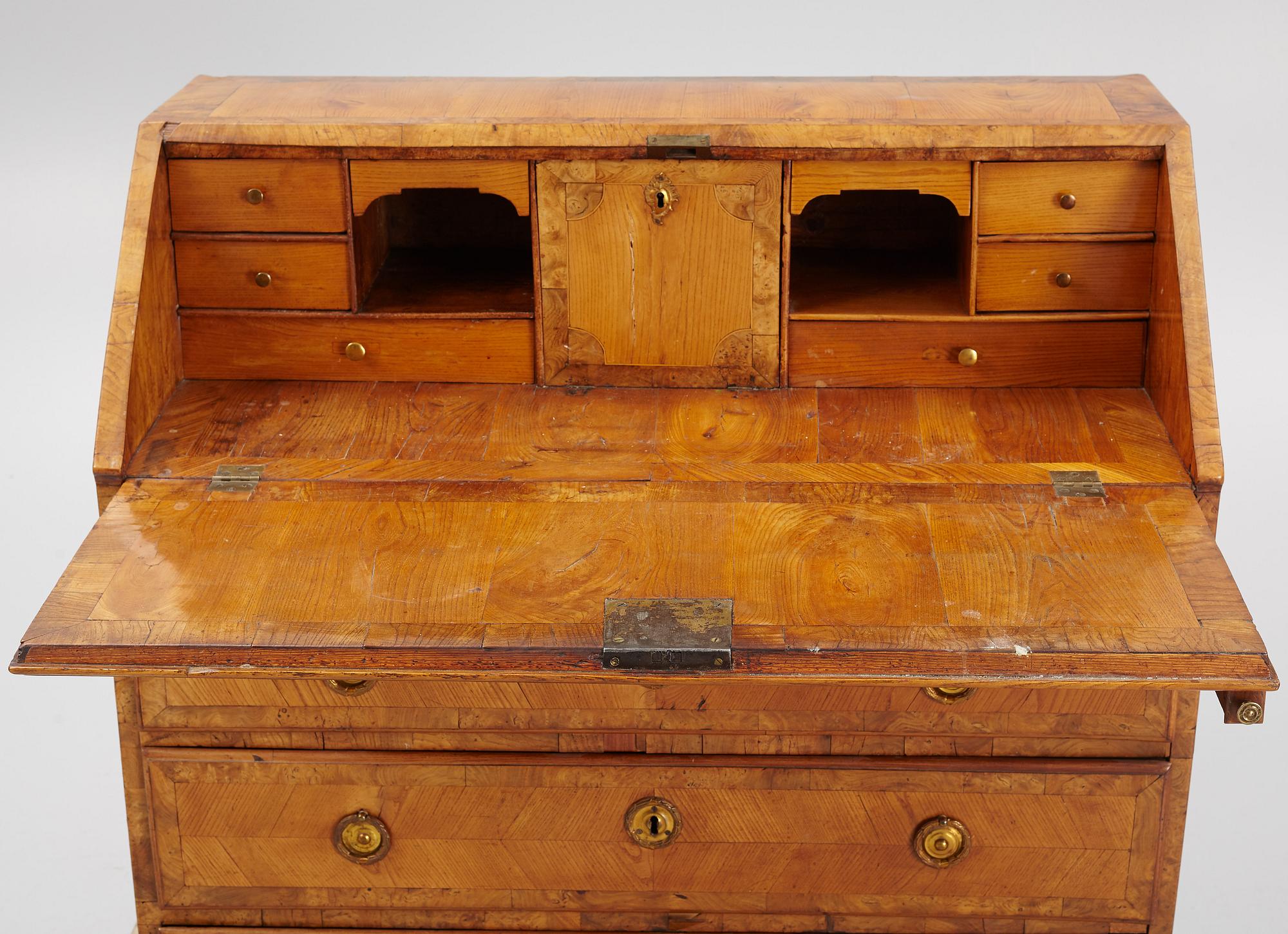 A Gustavian elm-veneered secretaire, late 18th century.