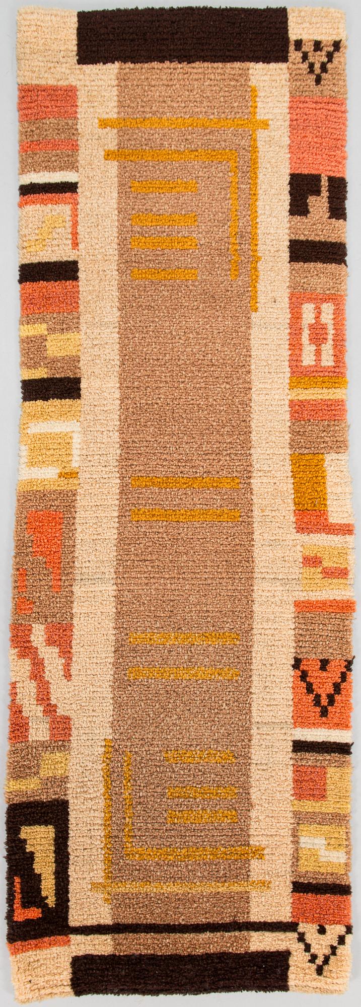 A 1930's Finnish long pile rug. Ca 140x47 cm.