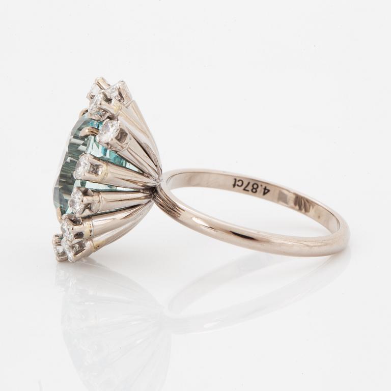 18K white gold diamond and aquamarine ring.