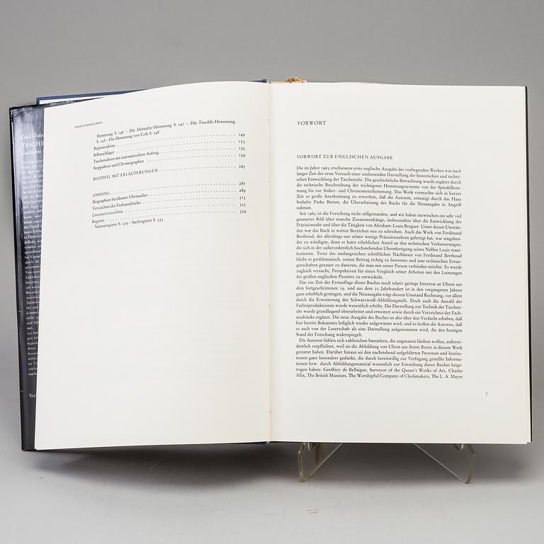 A set of 5 watch books.