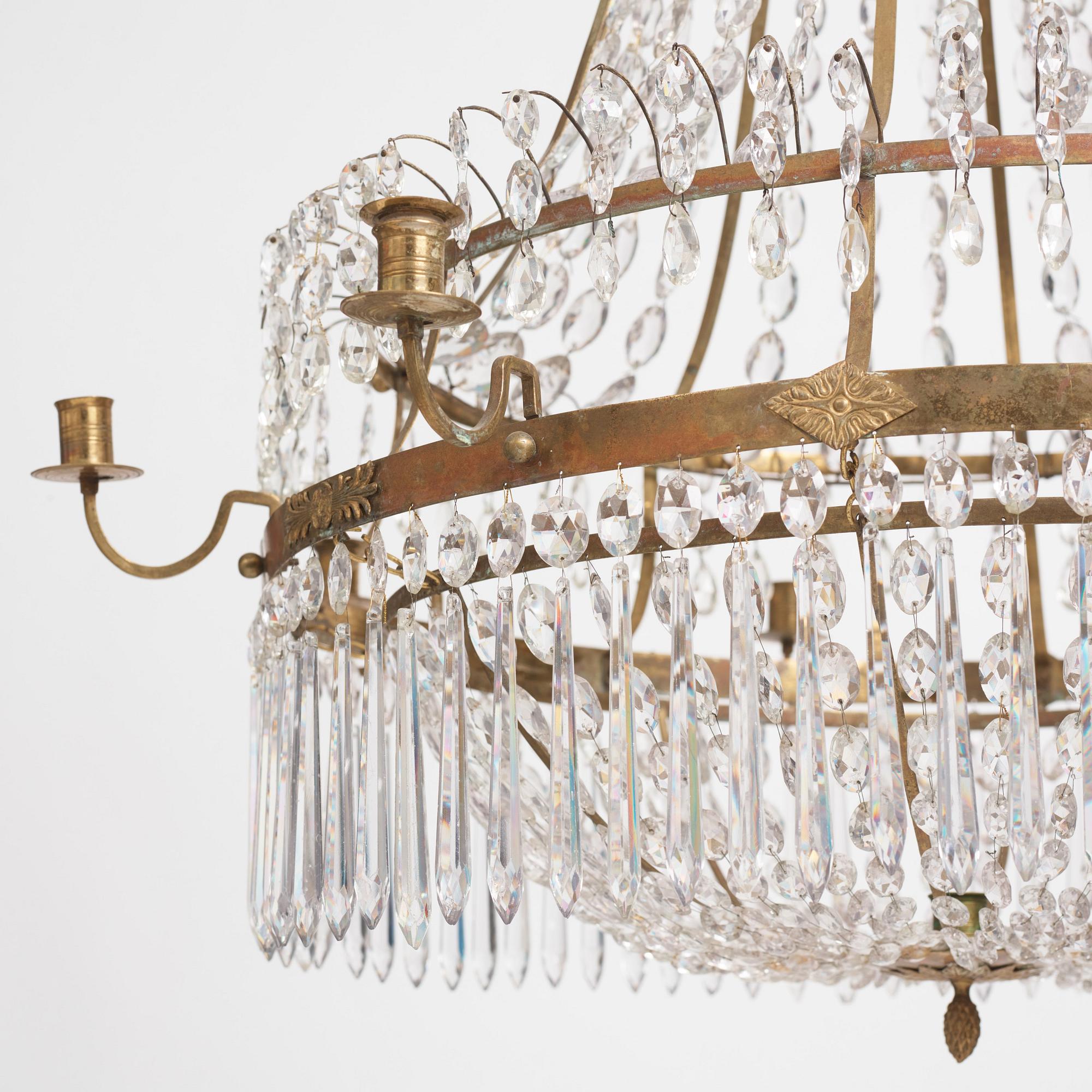 A late Gustavian nine-light gilt brass and cut glass chandelier, Stockholm, late 18th century.