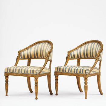 A pair of late Gustavian open armchairs attributed to E. Ståhl (master in Stockholm 1794-1820).