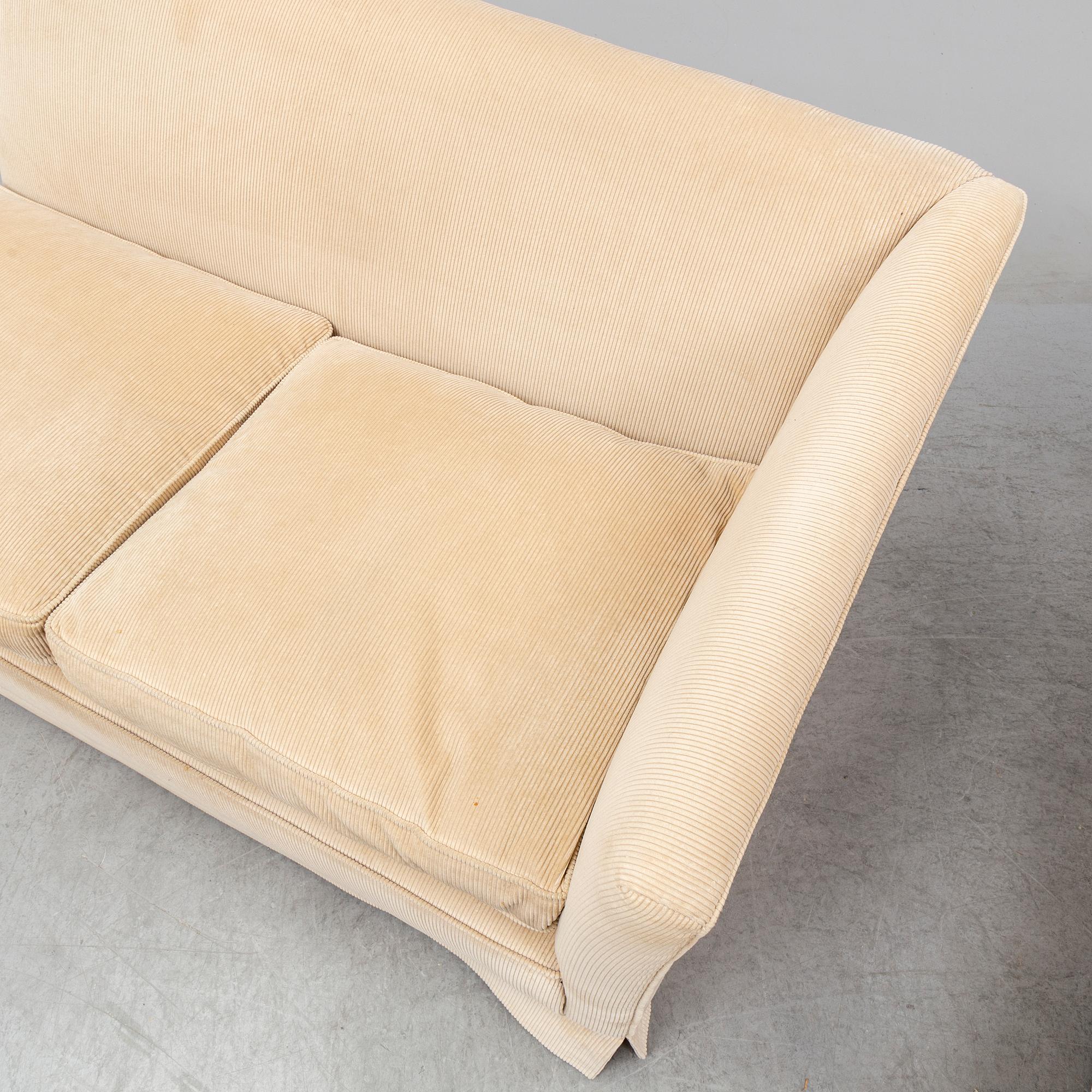 An end of the 20th Century sofa with cordory upholstery.