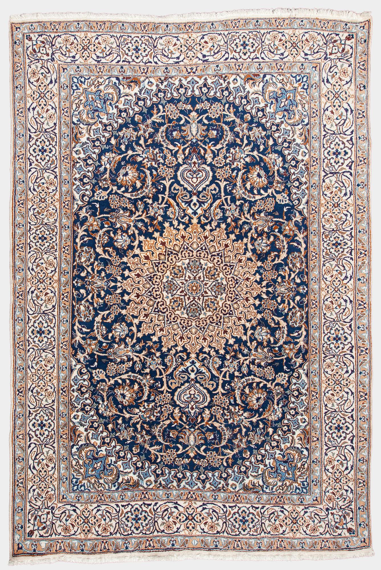 A carpet, Nain, part silk, ca. 295 x 201 cm.
