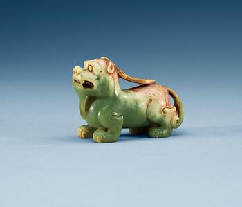 A carved nephrite figure of an archaistic buddhist lion, Qing dynasty.