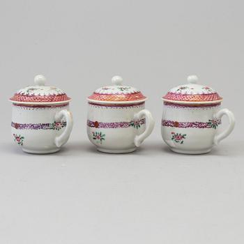 A set of three famille rose custard cups with cover, Qing dynasty, Qianlong (1736-95).