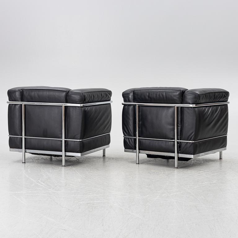 Le Corbusier (Charles-Édouard Jeanneret), Pierre Jeanneret, Charlotte Perriand & Le Corbusier, a pair of 'LC2' armchairs, Cassina.