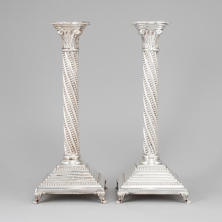 A pair of sterling silver candlesticks from Topazio, Portugal, late 20th Century.