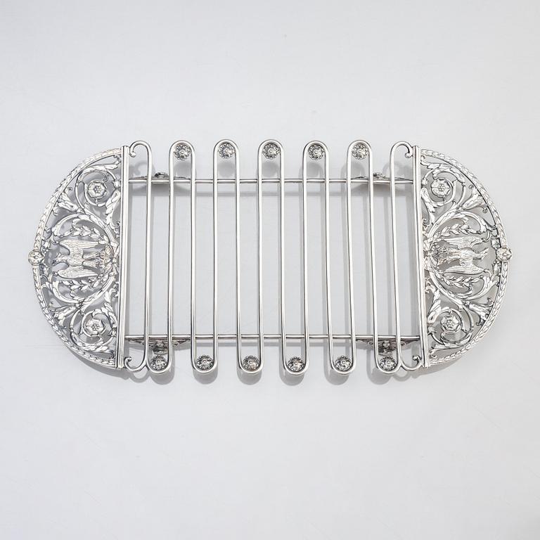 A silver asparagus cradle by Bolin, Moscow 1912-17.