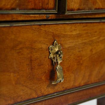 A late Gustavian mahogany chamberpot cupboard, circa 1800.