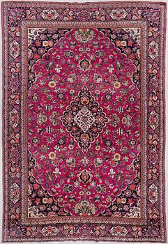 A CARPET, semi-antique Kashan, around 344 x 230 cm.