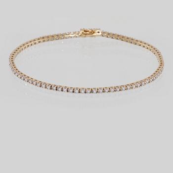 ARMBAND, 18K guld med briljantslipade diamanter 0.97 ct. Vikt 7,4 gram.