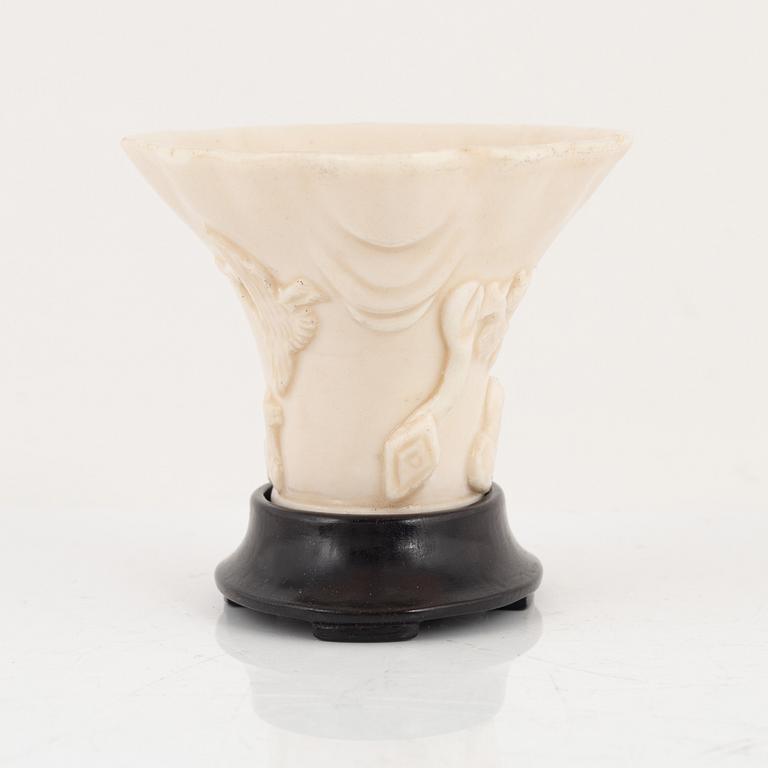 A blanc de chine libation cup, Qing dynasty.