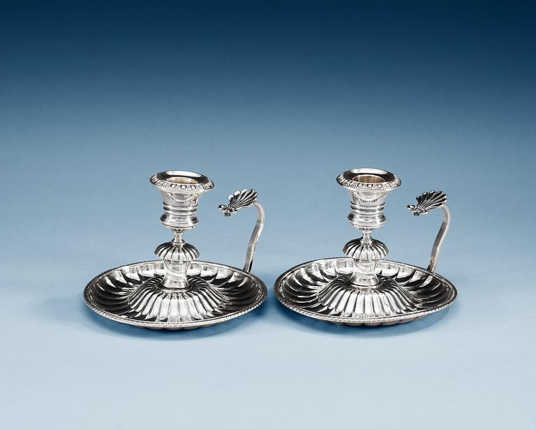 A PAIR OF SWEDISH SILVER CHAMBER CANDLESTICKS, Makers mark of Adolf Zethelius, Stockholm 1832.