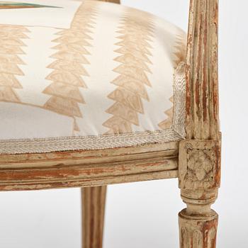 A pair of French Louis XVI children's open armchairs, late 18th century.