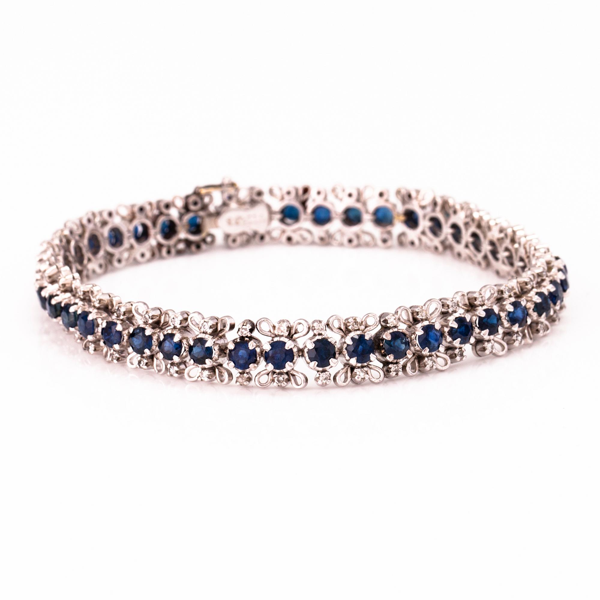 A white gold bracelet with sapphires and 8/8 cut diamonds ca. 0.75 ct in total.