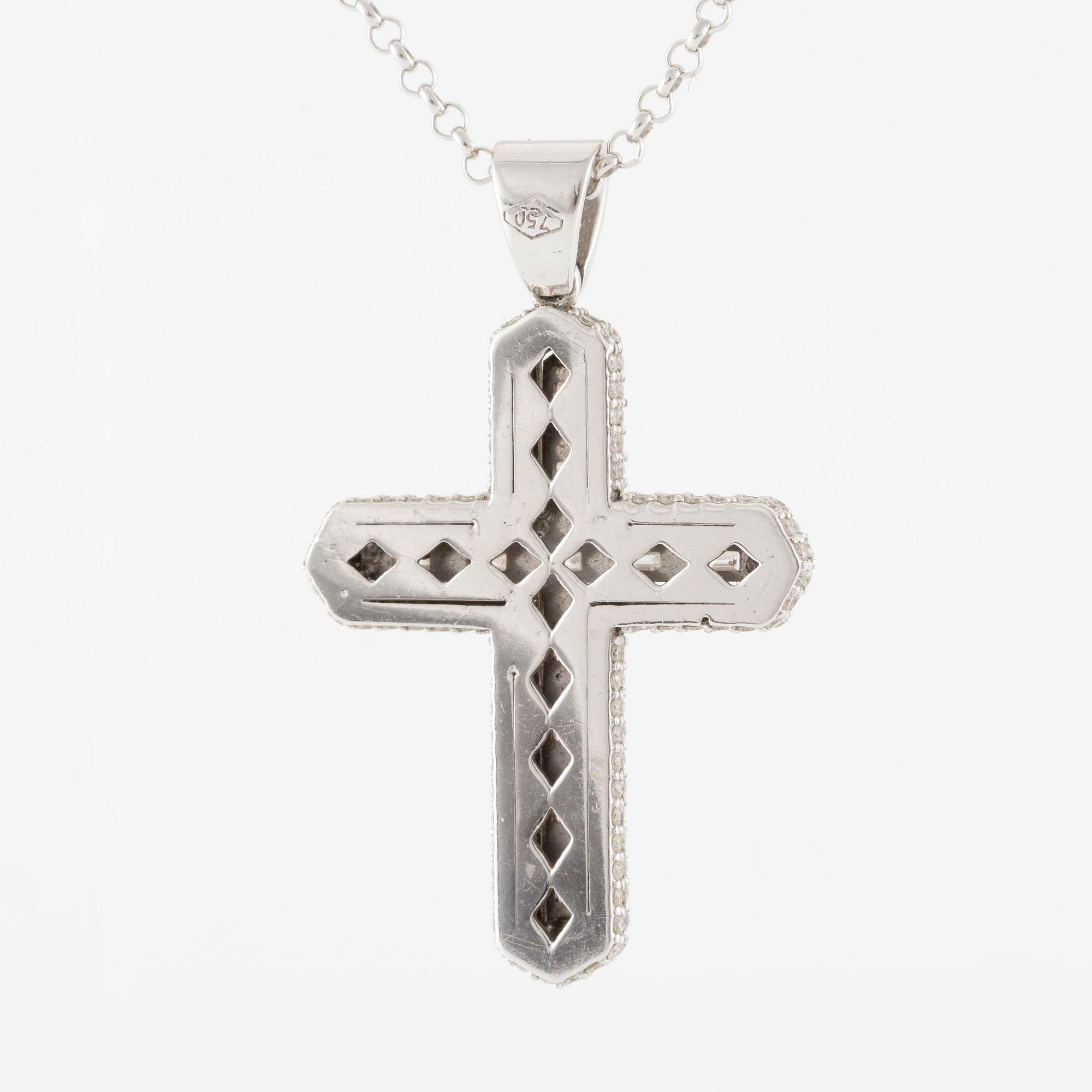 Necklace, 18K white gold in the form of a cross, set with baguette and brilliant-cut diamonds.