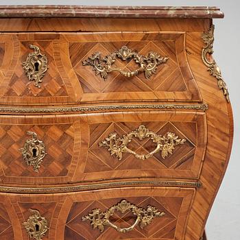 A rosewood-veneered and ormolu-mounted Rococo chest of drawers by J. Wahlbeck (master 1760-1782).