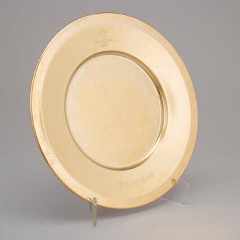 12 brass plates from Skultuna, late 20th century.