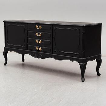 A second half of the 20th Century rococo style painted sideboard.