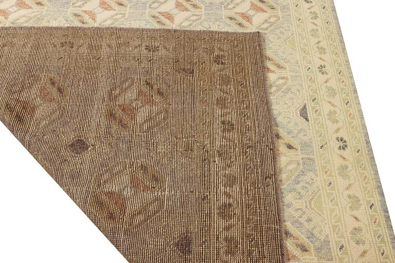 A Kazak carpet, c. 289 x 194 cm.