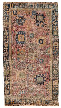 271. CARPET FRAGMENTS, an antique Kerman Vase-carpet, the beginning of the 18th century, ca 193,5 x 103,5 cm.