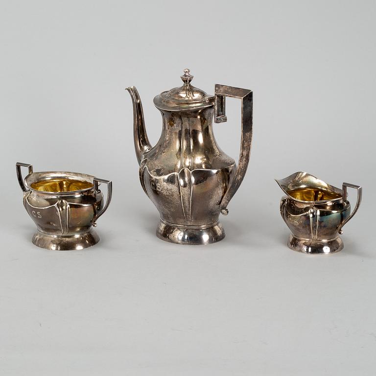 A silver coffee pot, creamer and a sugar bowl, Oulu, Finland 1921.