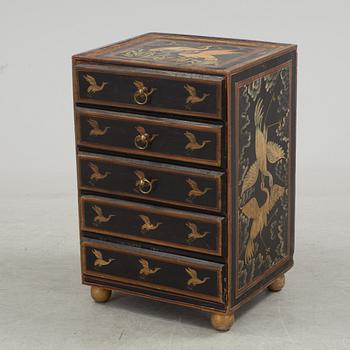 A 20th century oriental drawer.