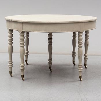 A mid 19th century painted dining table.