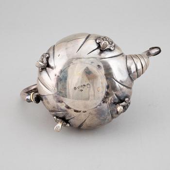 A Danish Rococo style silver teapot, P. Hertz, Copenhagen, Denmark, 1936.