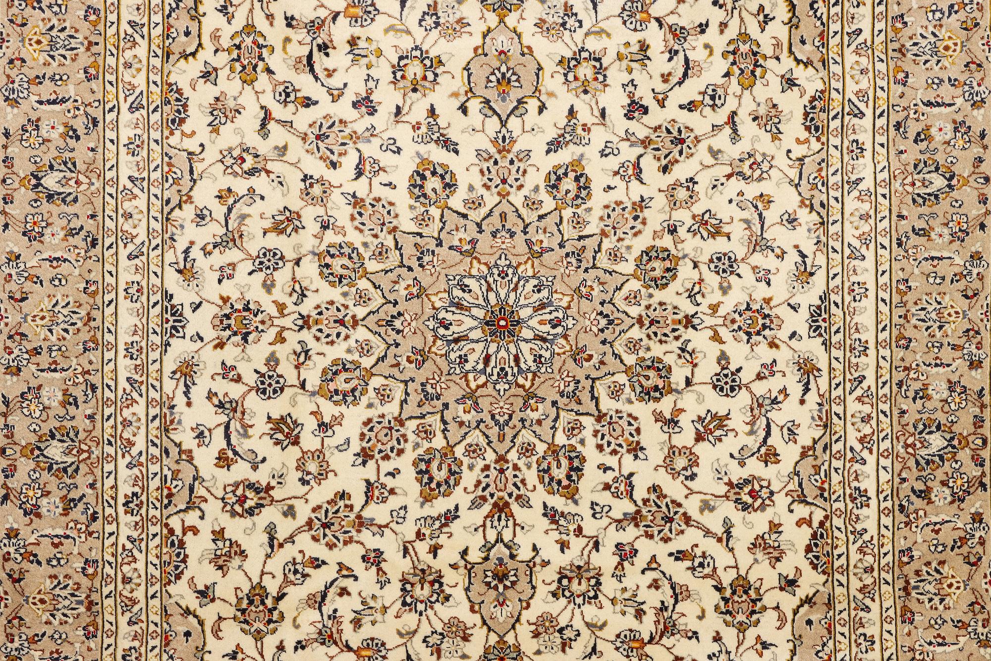 A Keshan carpet, c. 355 x 240 cm.