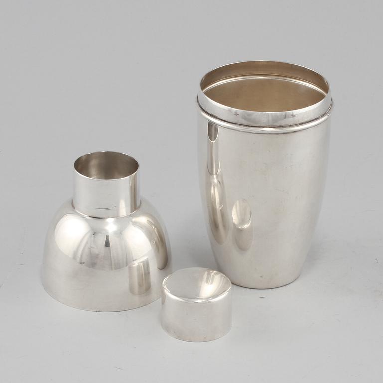 SHAKER, vitmetall, omkring 1900-talets mitt.