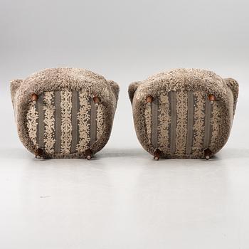 A pair of easy chairs, mid-20th century.