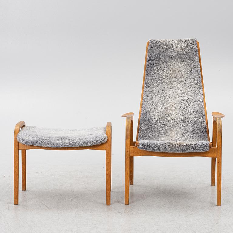 Yngve Ekström, a 'Lamino' armchair with ottoman and sidetable, Swedese, Sweden, 21st century.