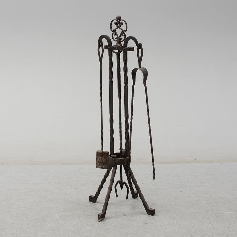 FIRE UTENSILS, iron, five parts, early 20th century.