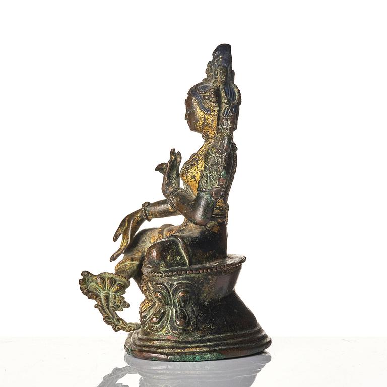 A copper alloy figure of Green Tara, Tibet, 17/18th century or later.