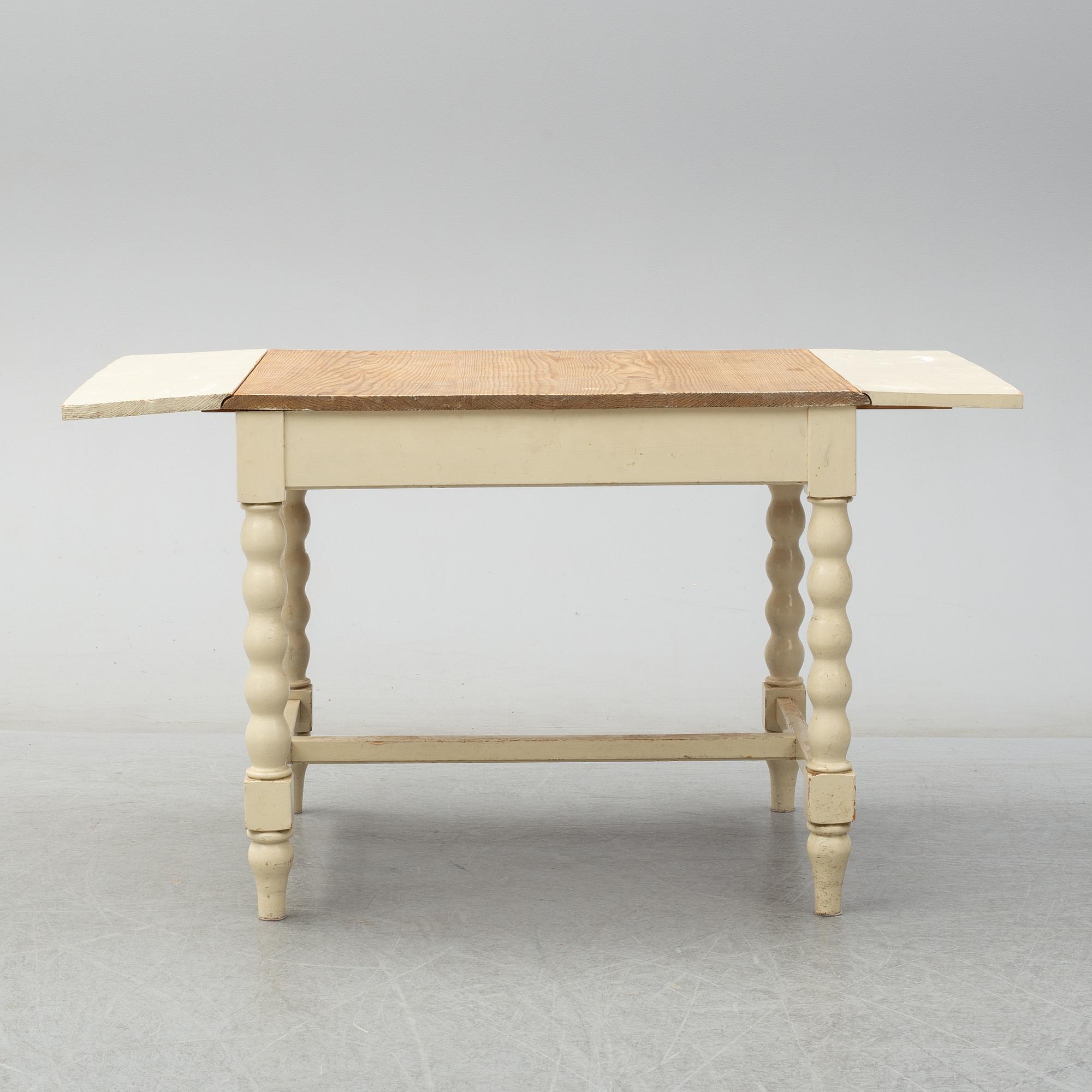 A set of table and two chairs, baroque-style, 20th century.