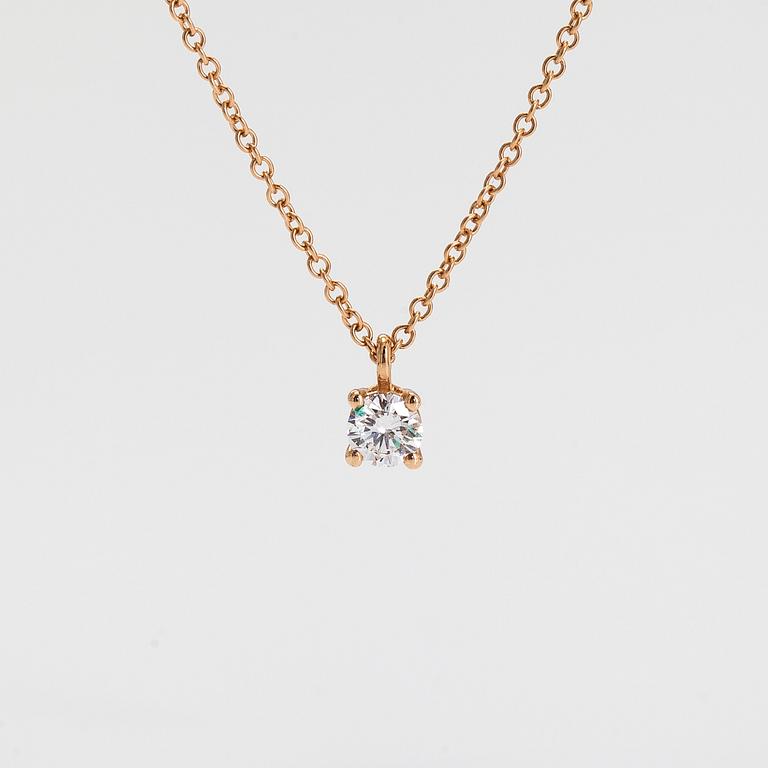 Tiffany & Co, an 18K gold necklace with a brilliant cut diamond ca. 0.17 ct.