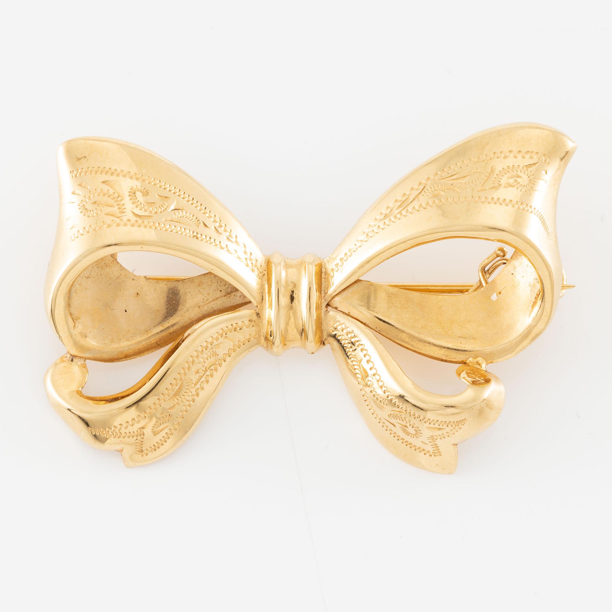 Brooch, 18K gold, bow.