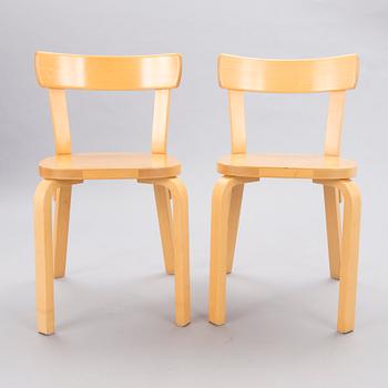 A Set of Three model 69 Chairs by Artek, late 20th Century.