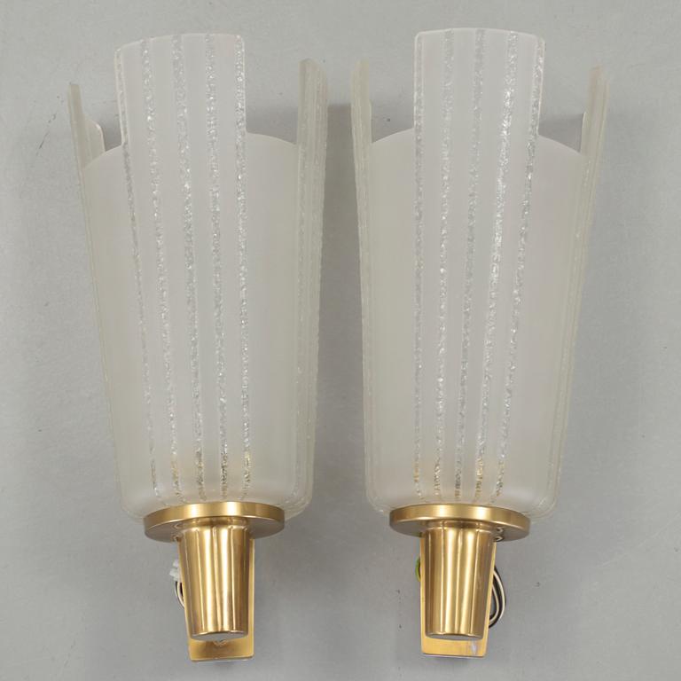 A pair of  Swedish Modern wall lamps, 1940's.