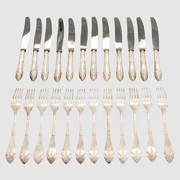 A 24-piece set of silver knives and forks, "Empire", C.G. Hallberg 1903.